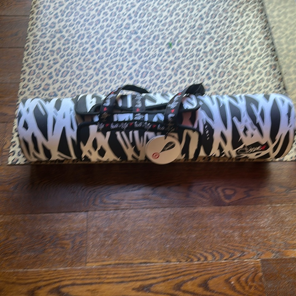 Yoga mat w carrying case. Collab w Neiman Target DVF